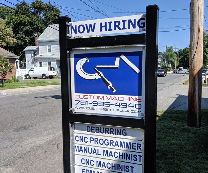 Custom Machine advertising job openings for deburrers, CNC programmers, manual machinists and CNC machinists